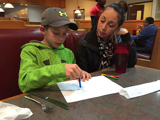 Kinder Elementary School fourth-grader Mason LaFargue with his mother Chasidy.